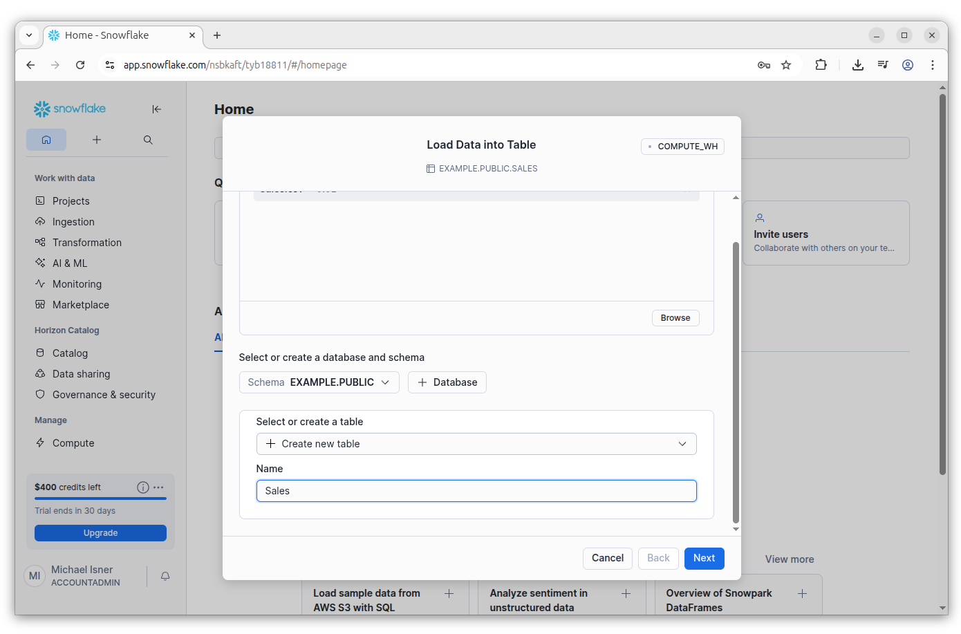 A screenshot of a web page with a button that says Load Data into Table .